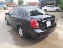 Daewoo Lacetti 2009 - Bán Daewoo Lacetti EX sản xuất năm 2009, màu đen số sàn giá cạnh tranh