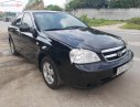 Daewoo Lacetti 2009 - Bán Daewoo Lacetti EX sản xuất năm 2009, màu đen số sàn giá cạnh tranh