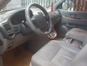 Kia Carnival 2009 - Cần bán Kia Carnival GS 2.5 AT sản xuất năm 2009, màu bạc như mới