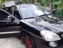 Daewoo Nubira II 1.6 2002 - Cần bán Daewoo Nubira II 1.6 năm 2002, màu đen số sàn