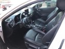 Mazda 3 2015 - Cần bán Mazda 3 1.5 AT sản xuất 2015, màu trắng, giá cạnh tranh