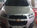 Chevrolet Captiva LT 2.4 MT 2013 - Cần bán lại xe Chevrolet Captiva LT 2.4 MT 2013, màu bạc còn mới giá cạnh tranh