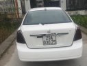 Daewoo Lacetti 2005 - Cần bán Daewoo Lacetti năm sản xuất 2005, màu trắng xe còn mới lắm