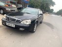 Daewoo Magnus 2004 - Cần bán xe cũ Daewoo Magnus 2.0 MT sản xuất 2004, màu đen, giá cạnh tranh