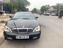 Daewoo Magnus 2004 - Cần bán xe cũ Daewoo Magnus 2.0 MT sản xuất 2004, màu đen, giá cạnh tranh