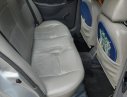 Daewoo Lanos 2005 - Cần bán lại xe Daewoo Lanos năm sản xuất 2005, màu bạc xe may chạy êm