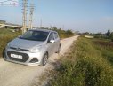 Hyundai Grand i10 2014 - Cần bán gấp Hyundai Grand i10 1.0 MT đời 2014, màu bạc, nhập khẩu nguyên chiếc số sàn
