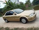 Ford Laser 2001 - Bán Ford Laser năm 2001, màu vàng, 125tr