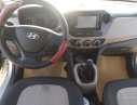 Hyundai Grand i10 2014 - Cần bán gấp Hyundai Grand i10 1.0 MT đời 2014, màu bạc, nhập khẩu nguyên chiếc số sàn