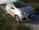 Hyundai Grand i10 2014 - Cần bán gấp Hyundai Grand i10 1.0 MT đời 2014, màu bạc, nhập khẩu nguyên chiếc số sàn