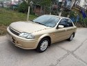 Ford Laser 2001 - Bán Ford Laser năm 2001, màu vàng, 125tr