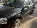 Daewoo Lacetti 2004 - Cần bán gấp Daewoo Lacetti EX đời 2004, màu đen