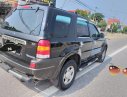 Ford Escape   2004 - Bán ô tô Ford Escape 2.0L 4x4 MT đời 2004, màu đen, số sàn