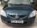 Mitsubishi Lancer 2004 - Bán Mitsubishi Lancer sản xuất năm 2004, màu xanh lam xe còn mới lắm