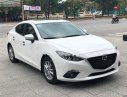 Mazda 3 2015 - Bán ô tô Mazda 3 2015, màu trắng xe còn mới lắm