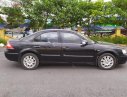 Ford Mondeo   2003 - Cần bán Ford Mondeo 2.5 AT đời 2003, màu đen, số tự động, 148tr 