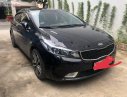 Kia Cerato  AT 2016 - Cần bán xe cũ Kia Cerato AT đời 2016, màu đen