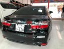 Toyota Camry 2016 - Cần bán gấp Toyota Camry 2.0E đời 2016, màu đen xe còn mới nguyên