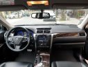 Toyota Camry   2016 - Bán Toyota Camry năm sản xuất 2016, màu đen số tự động xe còn mới nguyên