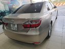 Toyota Camry 2017 - Cần bán gấp Toyota Camry đời 2017, màu vàng