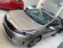 Kia Cerato   2018 - Cần bán gấp Kia Cerato 1.6 AT 2018, màu vàng, 590 triệu