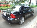 Ford Laser   2004 - Bán Ford Laser sản xuất năm 2004, màu đen số tự động xe còn mới lắm