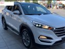 Hyundai Tucson 2018 - Cần bán lại xe Hyundai Tucson đời 2018, màu trắng xe còn mới lắm