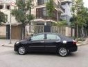Toyota Vios  E 2011 - Bán ô tô Toyota Vios E sản xuất năm 2011, màu đen xe gia đình, giá tốt