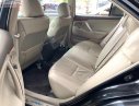 Toyota Camry 2.4G 2010 - Cần bán Toyota Camry 2.4G năm 2010, màu đen xe gia đình