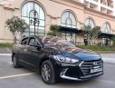 Hyundai Elantra 2018 - Bán Hyundai Elantra 1.6 MT đời 2018, màu đen số sàn, giá tốt