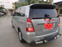 Toyota Innova 2.0E 2013 - Cần bán gấp Toyota Innova 2.0E sản xuất năm 2013, màu bạc