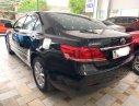 Toyota Camry 2.4G 2010 - Cần bán Toyota Camry 2.4G năm 2010, màu đen xe gia đình