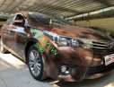 Toyota Corolla   2016 - Cần bán Toyota Corolla sản xuất 2016, màu nâu như mới