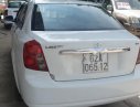 Daewoo Lacetti   2005 - Cần bán gấp Daewoo Lacetti sản xuất năm 2005, màu trắng xe còn mới lắm