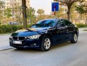 BMW 3 Series 320i 2014 - Bán xe BMW 3 Series 320i sản xuất năm 2014, màu đen, xe nhập, 850 triệu