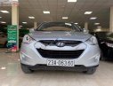 Hyundai Tucson 2.0 AT 4WD 2011 - Bán Hyundai Tucson 2.0 AT 4WD sản xuất 2011, màu bạc, nhập khẩu số tự động