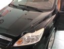 Ford Focus 1.8 2011 - Cần bán xe Ford Focus 1.8 năm sản xuất 2011, màu đen, 332 triệu