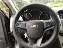 Chevrolet Cruze LS 1.6 MT 2015 - Cần bán Chevrolet Cruze LS 1.6 MT sản xuất 2015, màu đen như mới, giá tốt