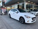 Mazda 2 2017 - Bán ô tô Mazda 2 sản xuất 2017, màu trắng, xe còn mới lắm