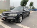 Ford Laser   2004 - Bán ô tô Ford Laser sản xuất năm 2004, màu đen, chính chủ