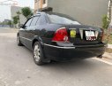 Ford Laser   2004 - Bán ô tô Ford Laser sản xuất năm 2004, màu đen, chính chủ