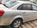 Daewoo Lacetti 2009 - Bán ô tô Daewoo Lacetti sản xuất năm 2009, màu bạc xe gia đình