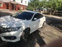 Honda Civic 1.8 E 2018 - Cần bán lại xe Honda Civic 1.8 E đời 2018, màu trắng, xe nhập 