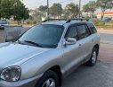 Hyundai Santa Fe Gold 2.0 AT 2004 - Cần bán gấp Hyundai Santa Fe năm sản xuất 2004, màu bạc, xe nhập chính hãng