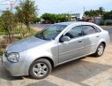 Daewoo Lacetti EX 1.6 MT 2004 - Cần bán lại xe Daewoo Lacetti EX 1.6 MT đời 2004, màu bạc