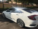 Honda Civic 1.8 E 2018 - Cần bán lại xe Honda Civic 1.8 E đời 2018, màu trắng, xe nhập 