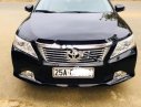 Toyota Camry 2.0E 2014 - Cần bán Toyota Camry 2.0E năm sản xuất 2014, màu đen