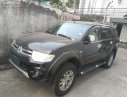 Mitsubishi Pajero Sport 2015 - Xe Mitsubishi Pajero Sport AT 3.0 đời 2015, màu đen xe gia đình