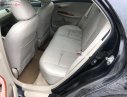 Toyota Corolla 2010 - Cần bán xe Toyota Corolla năm sản xuất 2010, màu đen, xe nhập