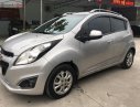 Chevrolet Spark 1.0 MT 2013 - Cần bán lại xe Chevrolet Spark 1.0 MT đời 2013, màu bạc số sàn giá cạnh tranh